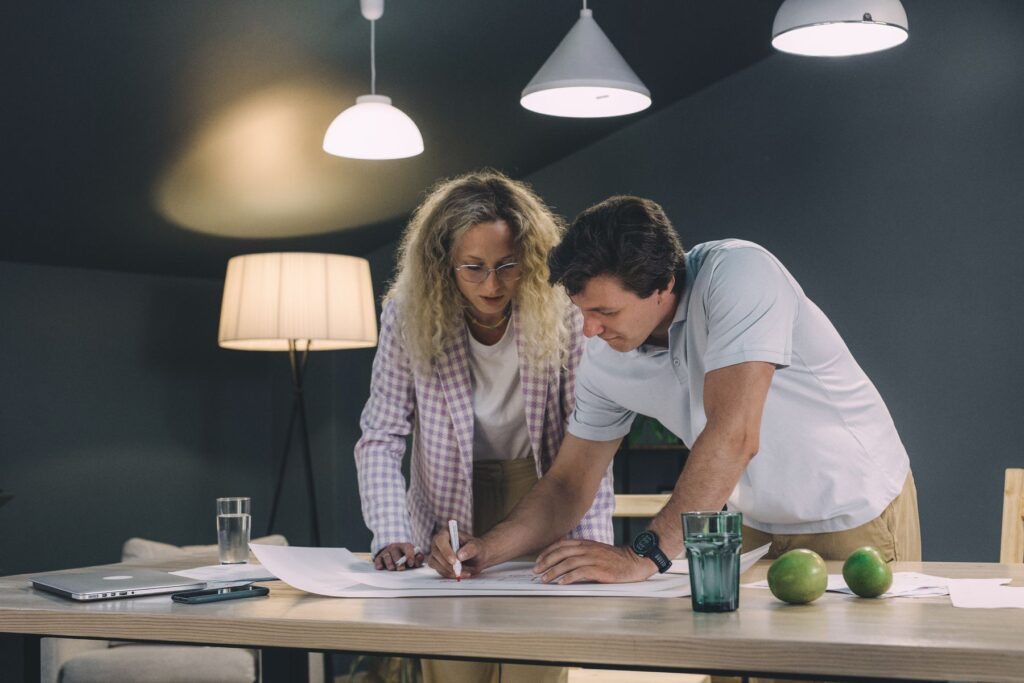 Architects reviewing a lighting layout