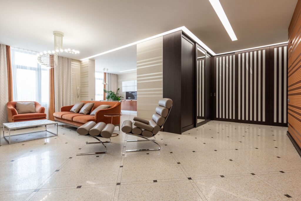 Modern apartment with linear ceiling lighting