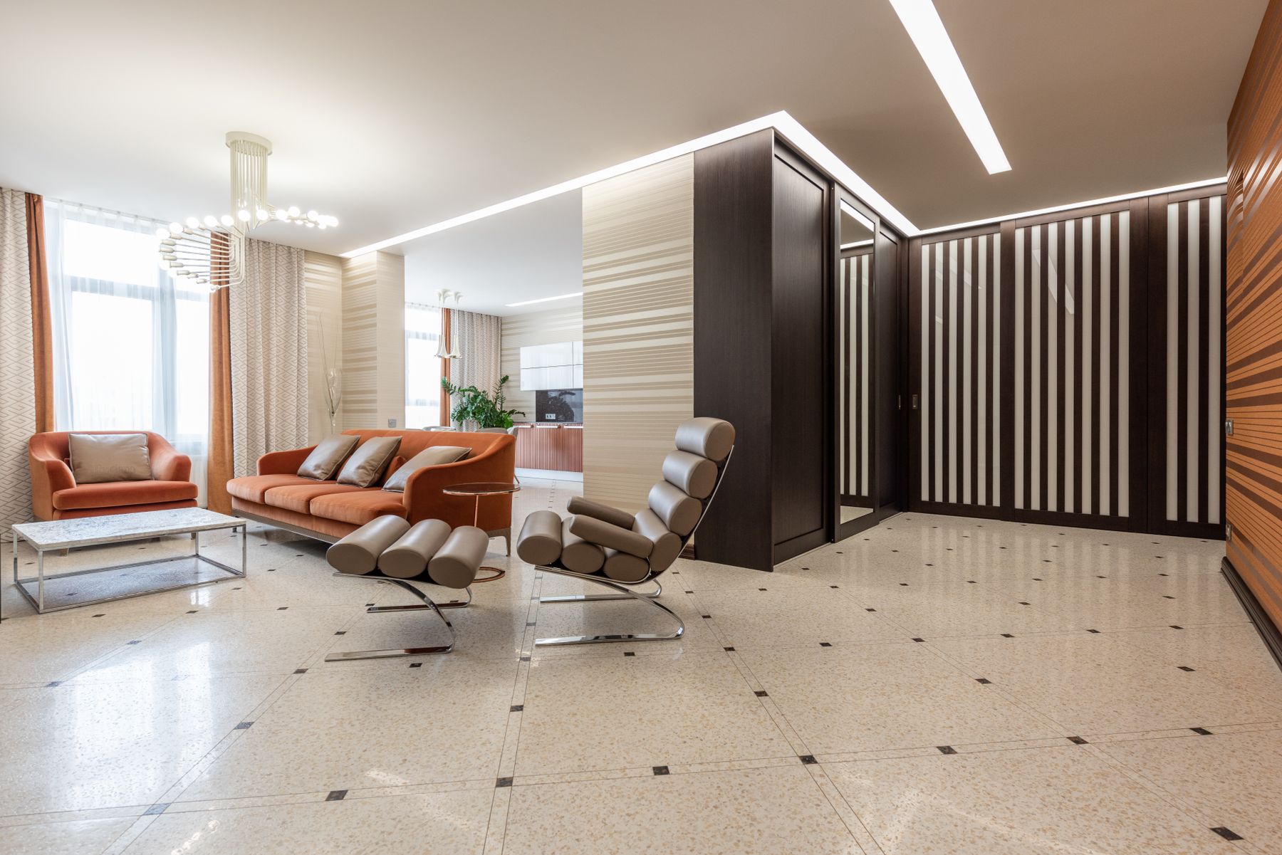 Modern apartment with linear ceiling lighting